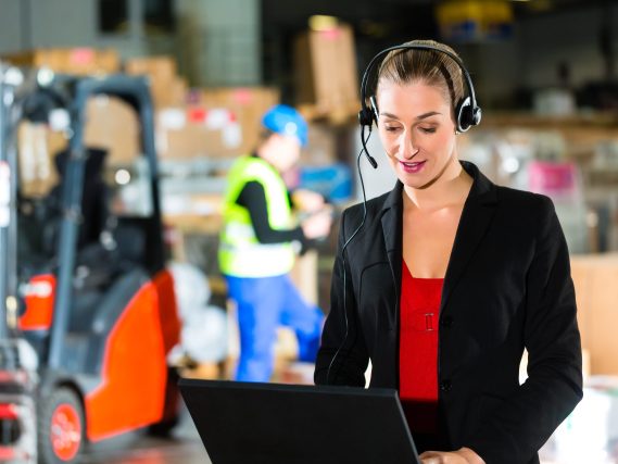 dispatcher using headset at warehouse of forwarding